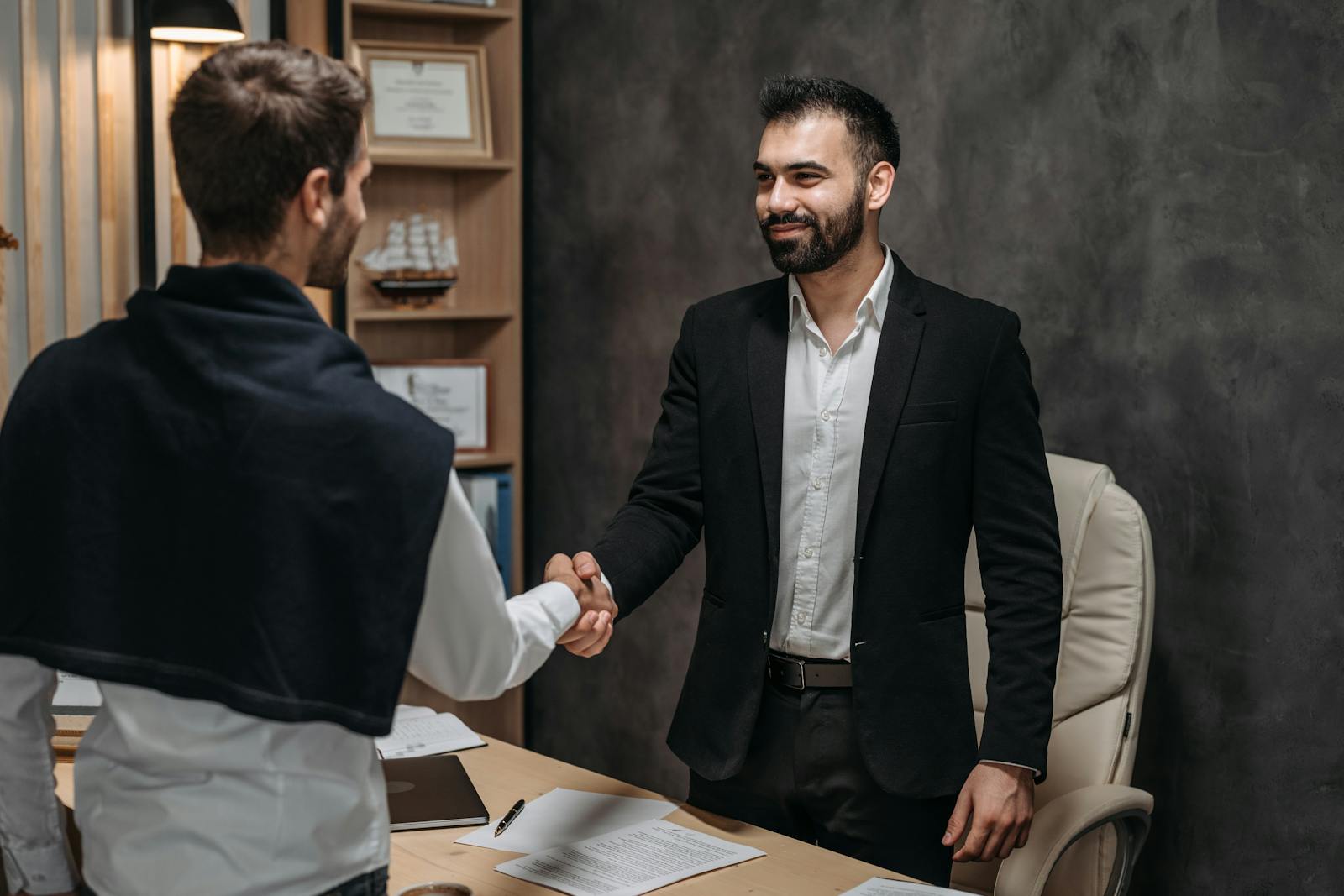 a man negotiating with his boss for a raise